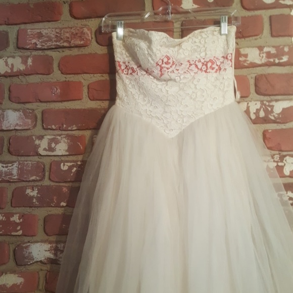 white dress with red bow